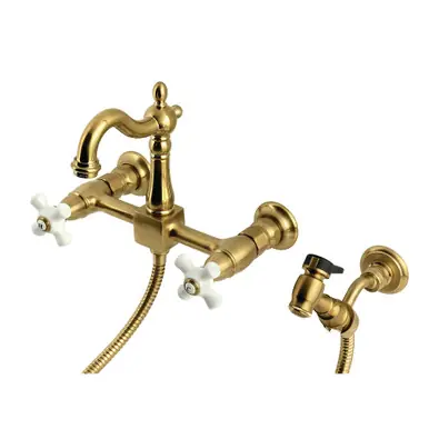 Kingston Brass Heritage Wall Mount Bridge Kitchen Faucet with Brass Sprayer, Brushed Brass - KS2447PXBS Shop Now